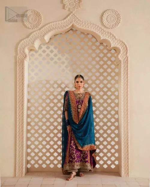 Tailored half sleeves and finished edges on magenta net mehndi shirt.