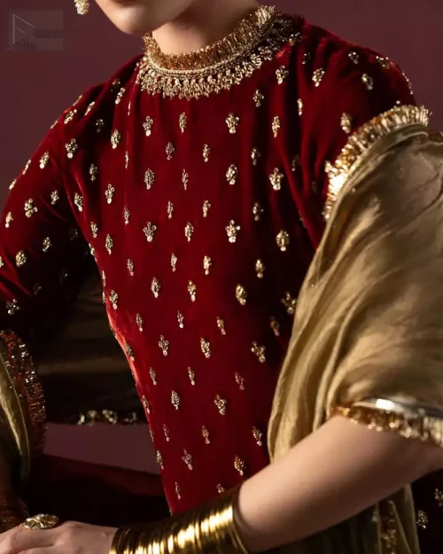 Half sleeves with kiran lace cuffs on maroon velvet party shirt.