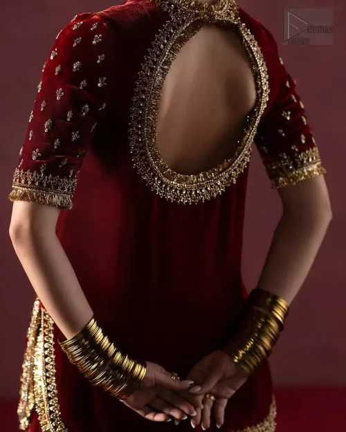 Back view of maroon velvet short shirt and sharara ensemble.