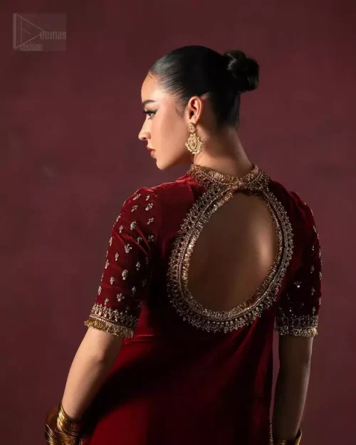 Maroon velvet sharara bottom flare and finished edges.