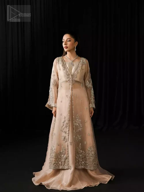 The lehenga sways beneath in organza layers, and whispers serenity with every step.