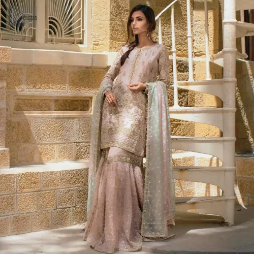 Round neckline and multi-colour thread embroidery on pastel pink raw silk bodice.