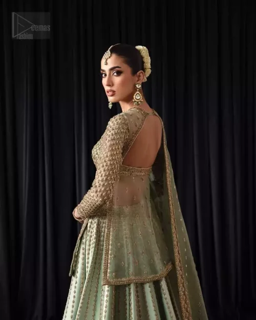 Fully covered back design of pistachio Nikah short shirt and silk lehenga.