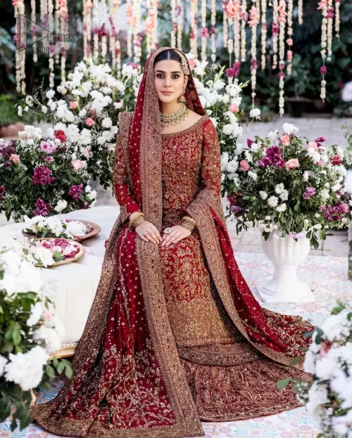 Crimson red organza long shirt and katan banarsi jamawar farshi lehenga styled for a grand wedding reception.
