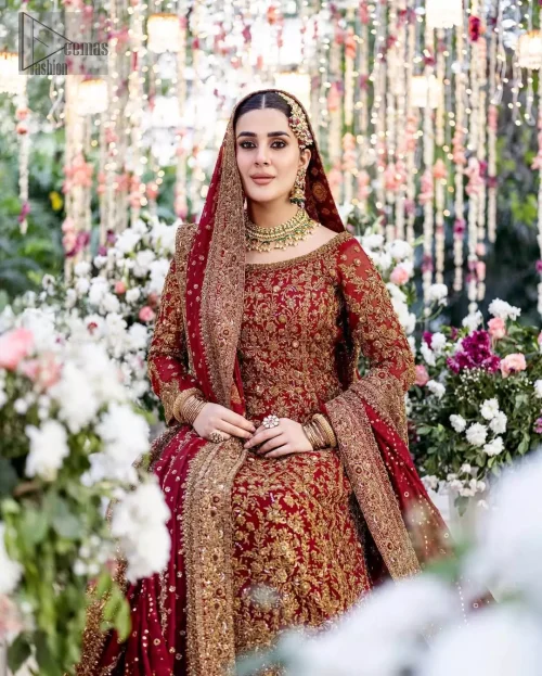 Close-up of dabka, stones, pearls, and Swarovski crystals on red reception outfit.