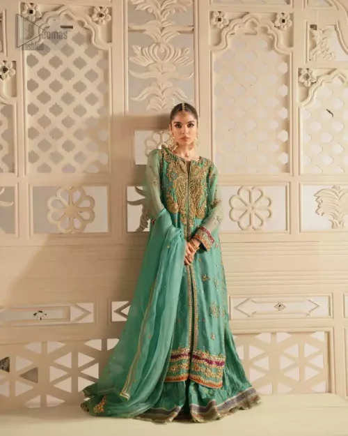 Action shot of sea green mehndi outfit showing movement and fit.