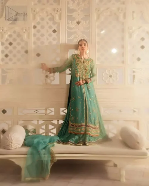 Full sleeves and raw silk fabric texture on sea green mehndi shirt.