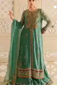 Front view of sea green raw silk front-open shirt and crushed sharara for mehndi events.