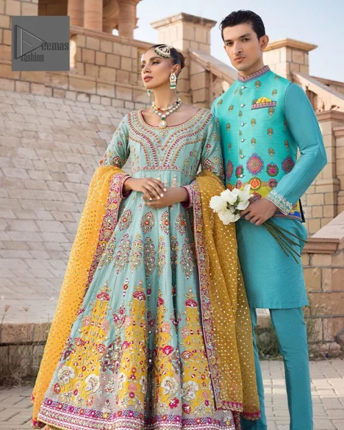Effortlessly achieve the perfect bride look with this mehndi wear! Turquoise Frock is adorned with gorgeous motifs in multiple colors.